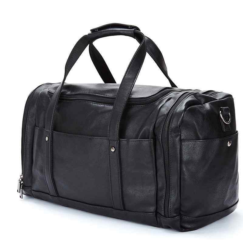 Black PU men's travel bag with multiple compartments and soft texture, featuring a fashion trend style and dimensions of 50cm by 26cm.