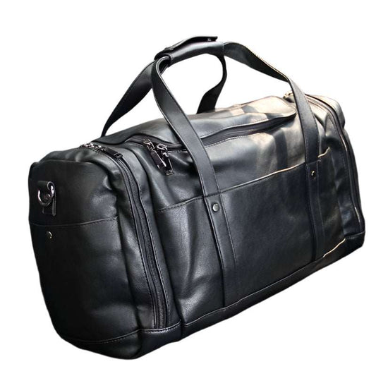Black PU men's travel bag with multiple compartments, soft cortex, and fashion trend design.