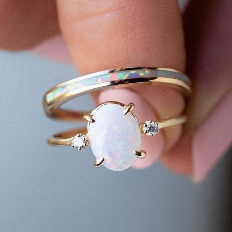 Simple Retro Round Gemstone Ring with oval opal centerpiece and two small side stones on gold band, unisex design