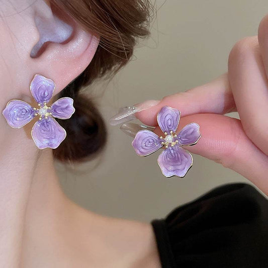 Elegant purple flower-shaped all-match ear studs with electroplated finish, lightweight and stylish for casual or formal wear