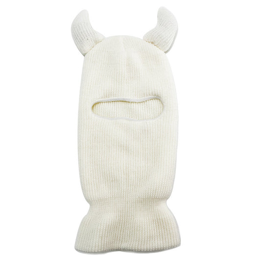 White knit balaclava with animal horn designs on a white background