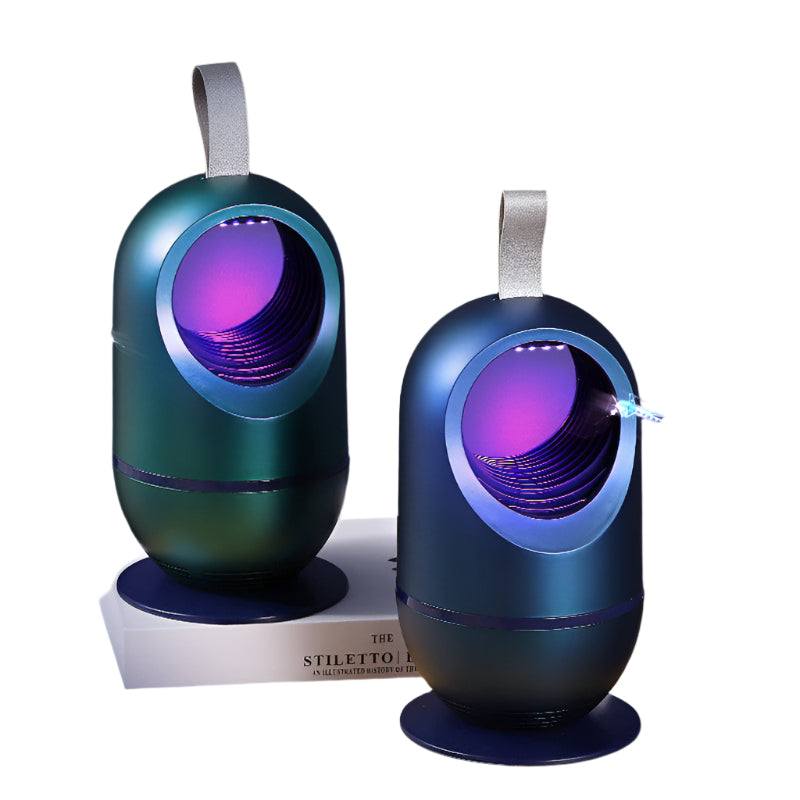 Indoor photocatalyst mosquito killer lamp in blue and green capturing mosquitoes.