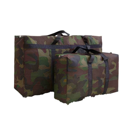 Camouflage moving packing bags on plush carpet, featuring sturdy handles and Oxford cloth material.