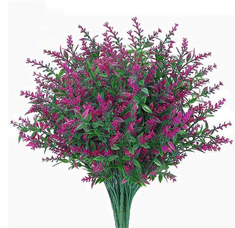 Artificial lavender flower bouquet in vibrant purple and green colors.