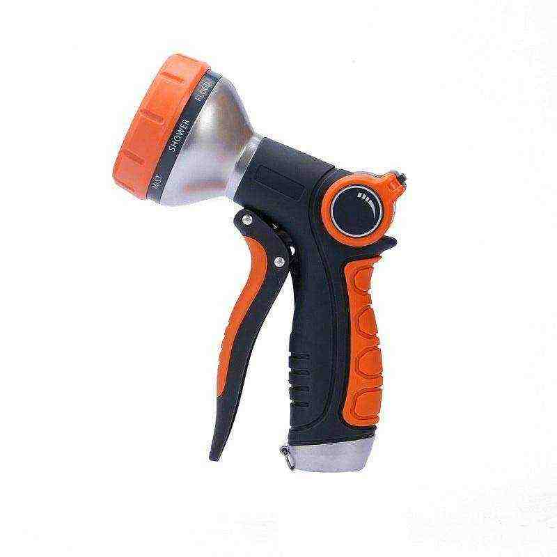 Garden irrigation tool with ergonomic design and adjustable spray modes.