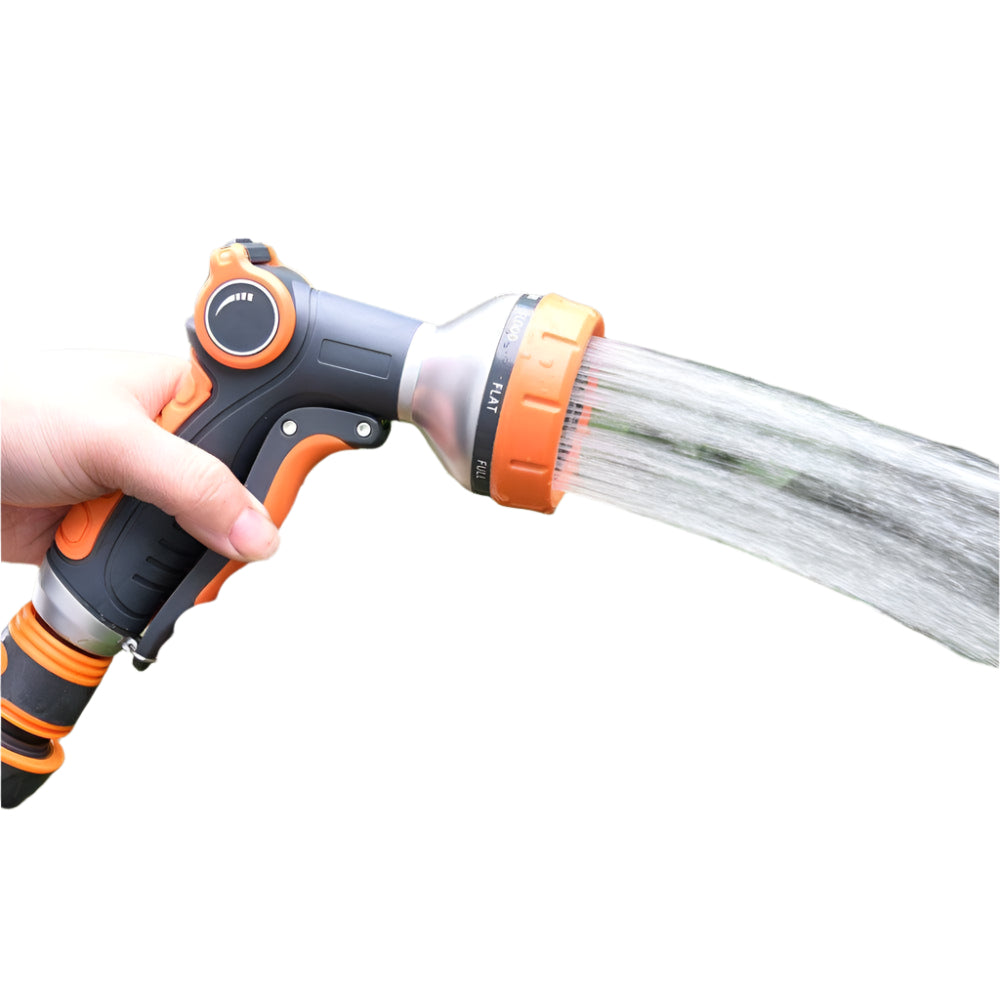 Garden irrigation tool spraying water on plants with adjustable nozzle.