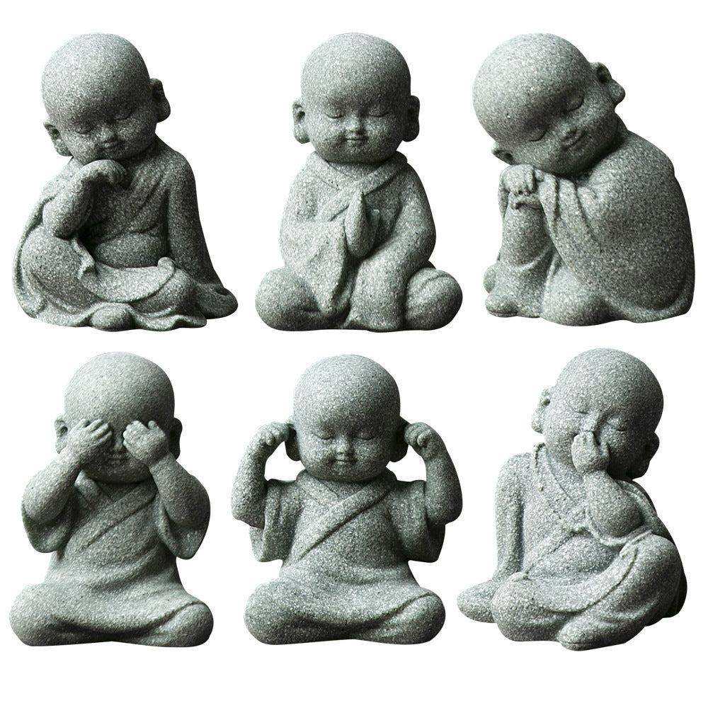 Creative Samanera decoration bonsai with resin figures in meditation and various poses.