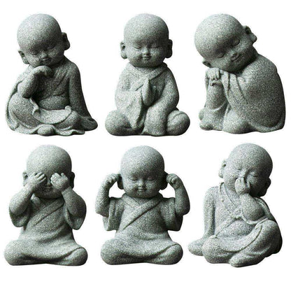 Creative Samanera decoration bonsai with resin figures in meditation and various poses.