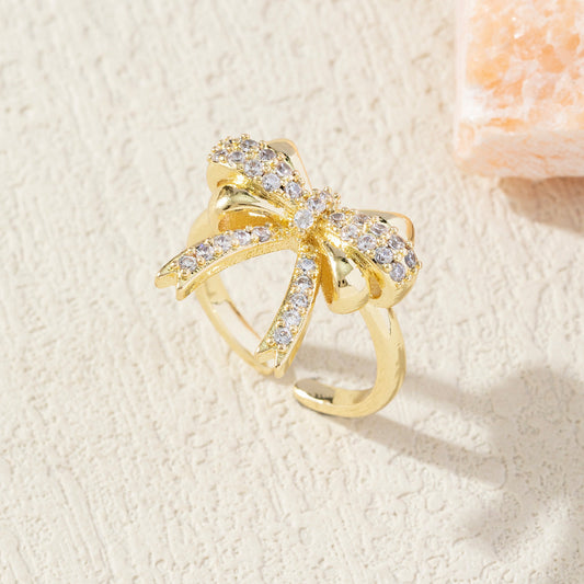 18K gold-plated adjustable ring with diamond bow design and copper plating for women