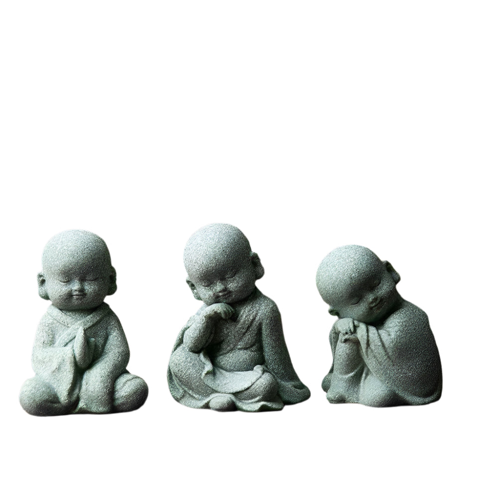 Creative Samanera bonsai decoration with three resin figures in a Chinese style garden setting.