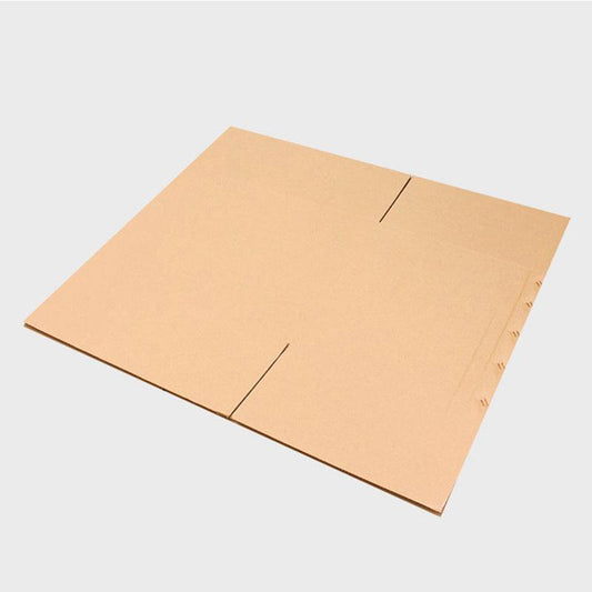 Thick corrugated packing box in original paper color, flat and ready for assembly.