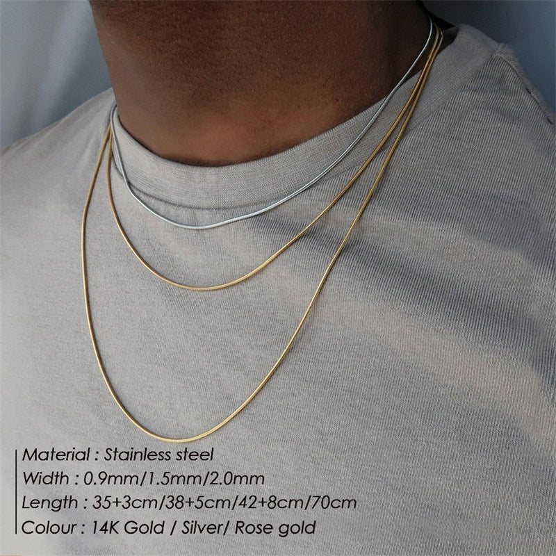 Women's long stainless steel necklace in 14K gold, silver, and rose gold with varying widths and lengths, simple and elegant design
