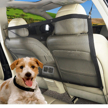 Black nylon mesh dog barrier isolation net installed between car front seats with happy dog in backseat