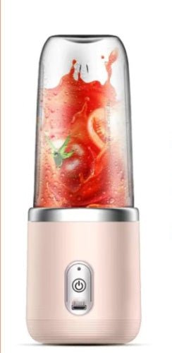 Portable blender making smoothie with fruits, USB charging, compact design.