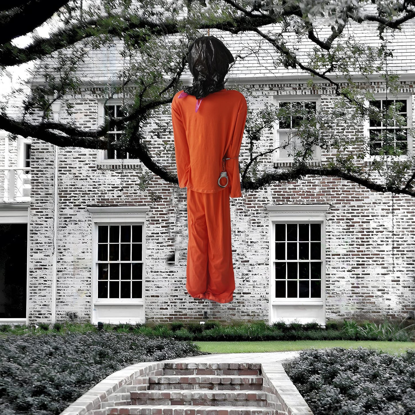 Realistic backyard prisoner corpse Halloween decoration with rope 