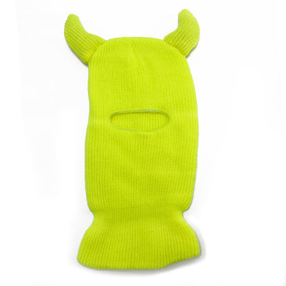 Bright green ski mask with animal ears on a white background