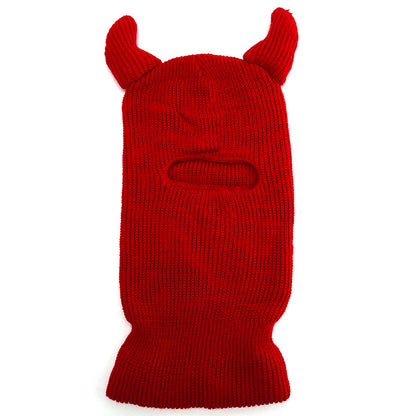 Red knitted balaclava with animal ears on a white background