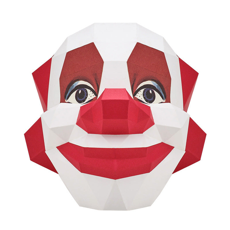 Front angled view of a red and white clown mask on a white background