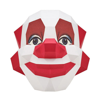 Front angled view of a red and white clown mask on a white background